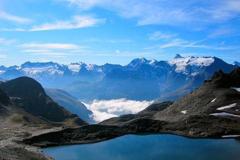 Vue depuis le col des Fours sur le lac du Grand Fond et les sommets frontaliers